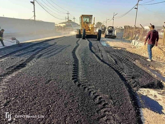 قیرتاوکردن و نۆژەنکردنەوەی چاڵ و شکستەکان و هەڵگرتنی تاسە کۆنکرێتیەکانی ڕێگای سەرەکی گەزنە، 