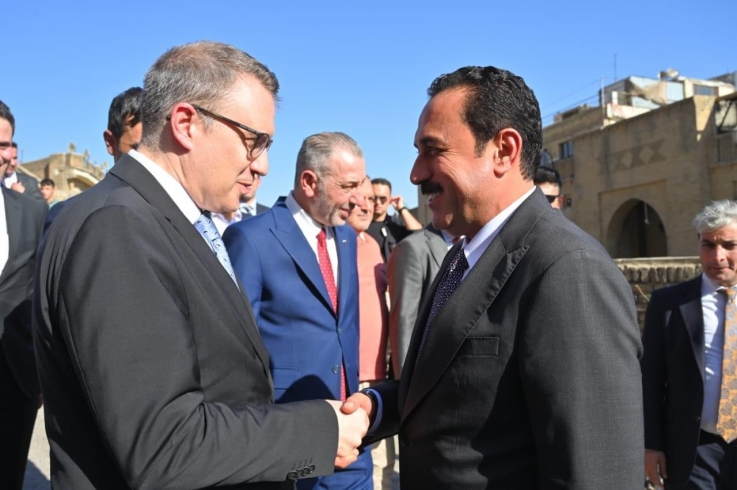 The Governor of Erbil welcomes the new Turkish Ambassador to Iraq at the downtown market in the city