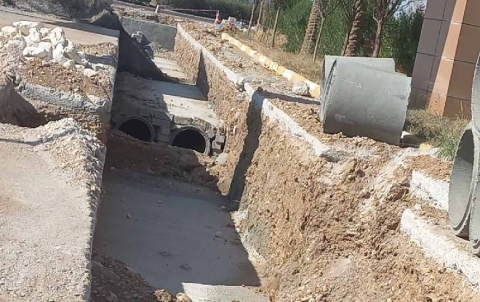 At a cost of more than (1 billion and 500 million dinars) Working on the project of construction of sewage and paving the streets of Asuda City neighborhood continues