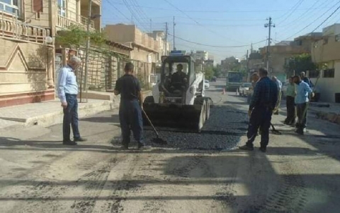 Paving and repairing potholes of several streets in Tayrawa neighborhood