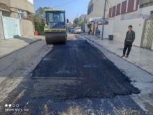 قیرتاوکردن و چاککردنەوەی چەند کۆڵانێک لە گەڕەکی کوردستان