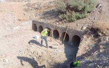 Clearing rainwater path and opening bridges and cleaning all the waterways and culverts on the main road (Doli Smaquli) 