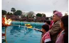 Erbil... President Barzani lights the torch of Newroz, accompanied by the children of the martyrs